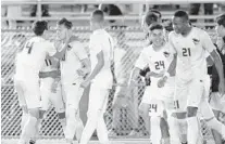  ?? GARY CURRERI/CORRESPOND­ENT ?? American Heritage-Plantation senior forward Landon Lupo, second from left, celebrates after scoring the game-winning goal.