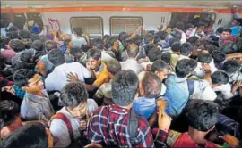  ?? HT FILE ?? Close to 80 lakh people travel daily on Mumbai’s suburban trains. On an average, 10 people die on the suburban network daily, mostly due to falling from the overcrowde­d trains.