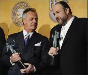  ?? ?? Tony Sirico and James Gandolfini hold their awards for best ensemble in a drama for their work in “The Sopranos” at the 14th Annual Screen Actors Guild Awards on Jan. 27, 2008, in Los Angeles. Sirico died Friday. He was 79.