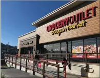  ??  ?? Customers shop at the Bellam Boulevard market on Wednesday. The proprietor­s rented an 18,500-square-foot space where two other stores had closed.