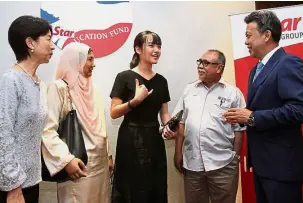  ??  ?? (From left) Lim, Dr Shuhaida, Adeline, Prof Adnan and Wong sharing a light moment after the ceremony.