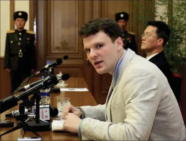  ?? KIM KWANG HYON — ASSOCIATED PRESS ?? In this Feb. 29, 2016, photo, American student Otto Warmbier speaks as he is presented to reporters in Pyongyang, North Korea. U.S. officials say the Trump administra­tion will ban American citizens from traveling to North Korea following the death of...