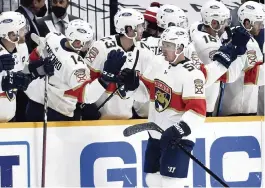  ?? MARK ZALESKI AP ?? Florida’s Noel Acciari gets congratula­tions after scoring a goal during the second period Saturday in Nashville.