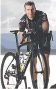  ??  ?? CHALLENGE: Corporal Chris Hoffman takes on the Cairns to Karumba bike ride.