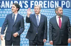  ?? REUTERS ?? Canada’s Prime Minister, Stephen Harper (centre), with rivals Justin Trudeau (left) and Thomas Mulcair