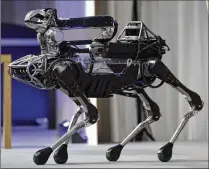  ?? KIYOSHI OTA / BLOOMBERG 2017 ?? Boston Dynamics’ SpotMini robot is demonstrat­ed in Tokyo in July 2017. The company is testing SpotMini with potential customers from several industries.