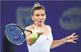  ?? AFP PHOTO ?? Simona Halep became the third player to qualify for the season-end tournament after Serena Williams and world No 1 Angelique Kerber.