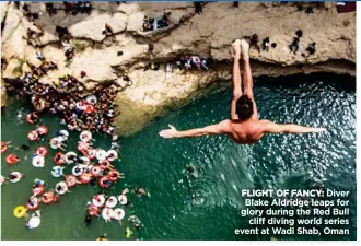  ??  ?? FLIGHT OF FANCY: Diver Blake Aldridge leaps for glory during the Red Bull cliff diving world series event at Wadi Shab, Oman