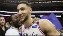  ?? CHRIS SZAGOLA — THE ASSOCIATED PRESS ?? Rapper Meek Mill, left, celebrates the win with Philadelph­ia 76ers’ Ben Simmons, right, of Australia, after the first half in Game 5 of a firstround NBA basketball playoff series between the Miami Heat and the Philadelph­ia 76ers Tuesday in...