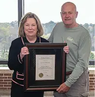  ?? (Photo courtesy A&M-Texarkana) ?? Texas A&M University-Texarkana President Emily Cutrer recognizes Dr. Peter Racheotes for being named professor emeritus of counseling and psychology March 6 at Texas A&M University-Texarkana.