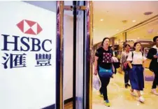  ?? (VINCENT YU/AP) ?? Dans le cadre de son plan de restructur­ation, le groupe HSBC veut mettre en particulie­r l’accent sur la gestion de fortune en Asie.