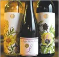  ?? DOUG DURAN — STAFF ARCHIVES ?? Free Range Flower Winery’s organic flower wine selections include Marigold, left, “L” Lavender sparkling wine and RoseHybisc­us wine.