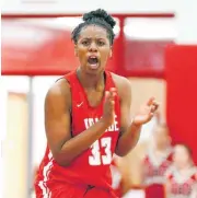  ?? [PHOTO BY NATE BILLINGS, THE OKLAHOMAN] ?? Prague’s Chantae Embry reacts after a play against Comanche in December.