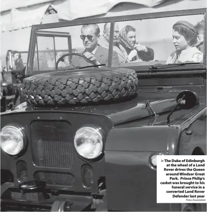  ?? Press Associatio­n ?? The Duke of Edinburgh at the wheel of a Land Rover drives the Queen around Windsor Great Park. Prince Philip’s casket was brought to his funeral service in a converted Land Rover Defender last year