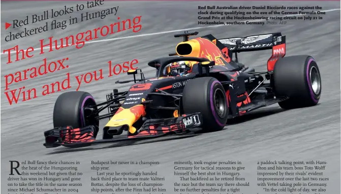  ?? Photo: AFP ?? Red Bull Australian driver Daniel Ricciardo races against the clock during qualifying on the eve of the German Formula One Grand Prix at the Hockenheim­ring racing circuit on July 21 in Hockenheim, southern Germany.