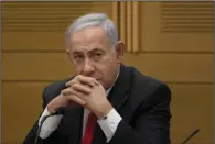  ?? (AP/Maya Alleruzzo) ?? Former Israeli Prime Minister Benjamin Netanyahu speaks to right-wing opposition party members at the Knesset, Israel’s parliament, in Jerusalem on June 14.
