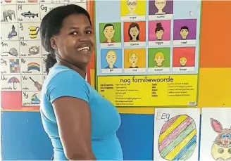  ?? ?? MOVING UP: Gladys Jaffon, of Mummy’s Day Care in Jeffreys Bay, is one of 14 early childhood developmen­t practition­ers who are working towards their NQF level 5 qualificat­ion