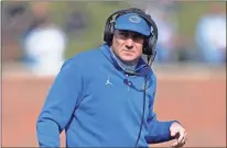  ?? Ap-jeff Roberson, File ?? Florida head coach Dan Mullen watches from the sideline during the first half of an NCAA college football game against Missouri in Columbia, Mo. Mullen had several players miss the team’s opening training camp practice.