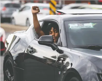  ?? ALLEN MCINNIS ?? Hundreds participat­ed in Sunday’s convoy, which criss-crossed Montreal. Advocates have long decried “driving while Black” cases around the city, arguing police are more likely to stop Black drivers for no discernibl­e reason.