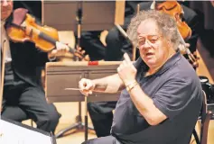  ??  ?? This file photo taken on Sept 4, 2007 shows US conductor James Levine and the Boston Symphony Orchestra performing Hector Berlioz’s “Damnation of Faust” during a rehearsal at the Salle Pleyel in Paris. — AFP photo