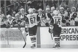  ??  ?? The Coyotes’ Lawson Crouse (67) celebrates his goal with teammates during the first period against the Kings Tuesday in Los Angeles.