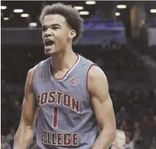  ?? AP PHOTOS ?? STILL SOARING: Jerome Robinson celebrates after a basket during Boston College’s 91-87 victory against North Carolina State yesterday in New York; at right, Robinson drives past N.C. State’s Abdul-Malik Abu.