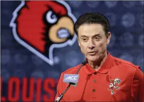  ?? BOB LEVERONE - THE ASSOCIATED PRESS ?? FILE - In this Oct. 26, 2016, file photo, Louisville NCAA college basketball head coach Rick Pitino answers a question during the Atlantic Coast Conference media day in Charlotte, N.C.