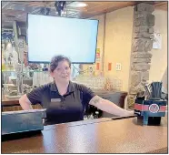  ?? (Special to NWA Democrat-Gazette/Lynn Atkins) ?? Tara Witten, bartender at the Highlands Pub and Patio, said she knows many of her customers by name and by drink.