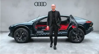  ?? ?? Marc Lichte devant l’Audi Activesphe­re, superbe réinterpré­tation du concept de berline tout-terrain.