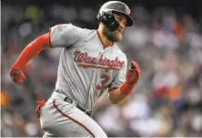  ?? Dustin Bradford / Getty Images ?? In his first seven seasons in the majors, outfielder Bryce Harper has 184 home runs, a .279 average and an OPS of .900.