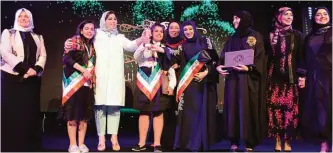  ??  ?? Sheikh Fadia Al-Saad Al-Sabah poses with some of the winning students.