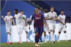  ?? AP PHOTO/MANU FERNANDEZ/POOL ?? Barcelona’s Luis Suarez reacts after Bayern Munich scored during the Champions League quarterfin­al match between FC Barcelona and Bayern Munich at the Luz stadium in Lisbon, Portugal, Aug. 14.