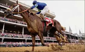  ?? Jeff Roberson / Associated Press ?? Luis Saez rides Secret Oath to victory in the 148th running of the Kentucky Oaks at Churchill Downs on May 6 in Louisville, Ky.