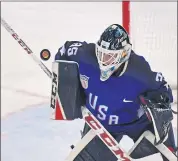  ?? ED JONES/AFP/GETTY IMAGES ?? USA’s Madeline Rooney defends the goal in the women’s gold medal ice hockey game, a shootout win for the U.S.