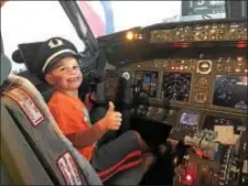  ?? SUBMITTED PHOTO ?? Shane, 6, of St. Louis, Mo., ended a visit to his grandparen­ts in Delaware County with a special experience at Philadelph­ia Internatio­nal Airport. While waiting for his flight on the evening of Sept. 27, Shane asked his mother to help him administer...