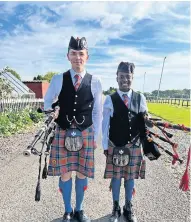  ?? ?? Pipers AJ MacGregor and James Soppitt of Blairgowri­e, Rattray and District Pipe Band
