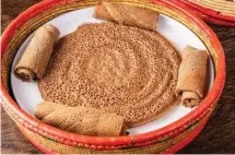  ??  ?? Above, from left: Ethiopian fermented flatbread, injera; Saba Alemayoh (from left) and Tekebash Gebre.