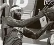  ?? Sue Ogrocki / Associated Press ?? DeMarcus Cousins had 17 points as part of the Rockets’ productive bench Monday.