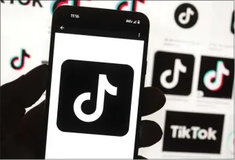  ?? MICHAEL DWYER, FILE — THE ASSOCIATED PRESS ?? The TikTok logo is seen on a cell phone in Boston.