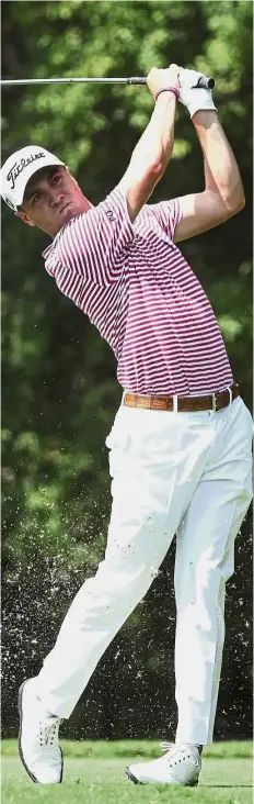  ?? — AFP ?? Making every shot count: American Justin Thomas playing his shot from the second tee during the second round of the Tour Championsh­ip at East Lake Golf Club on Friday.