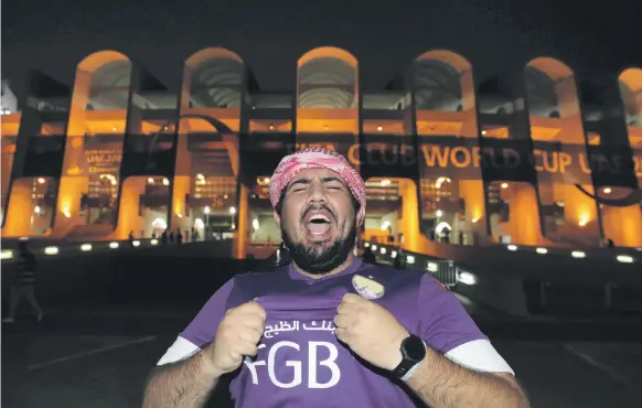  ?? Chris Whiteoak / The National ?? Al Ain fans celebrate after their footballin­g heroes beat River Plate on penalties in the Fifa Club World Cup semi-final on Tuesday