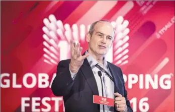  ?? BLOOMBERG ?? Michael Evans, co-president of Alibaba Group Holding Ltd, gestures as he speaks at a news conference during the company's annual November 11 Singles Day online shopping event in Shenzhen last year.