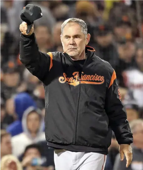  ?? MATT STONE / HERALD STAFF FILE ?? LURING A LEGEND: Former San Francisco Giants manager Bruce Bochy retired last season, but has since said he regretted the decision.