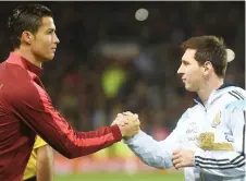  ?? ?? File photo shows Ronaldo and Messi before a friendly match. — AFP photo