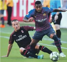  ?? AFP ?? Barcelona signed Brazilian winger Malcom, right, from under the noses of Italian side Roma during the summer
