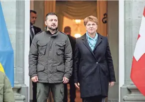  ?? ?? Switzerlan­d agreed in January to host the peace talks at the behest of Ukrainian President Volodymyr Zelenskyy, left, seen in January with Swiss Confederat­ion President Viola Amherd near Bern.
