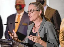  ?? AJC 2021 ?? U.S. Rep. Carolyn Bourdeaux, D-suwanee, seen in May, held a news conference Tuesday in Sugar Hill to promote legislatio­n she’s co-sponsored to reallocate unused COVID-19 funds for disaster and infrastruc­ture projects. Bourdeaux was one of the original 31 cosponsors when the bill was introduced by Rep. Dusty Johnson, R-S.D.