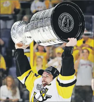  ?? AP PHOTO ?? Pittsburgh Penguins centre Sidney Crosby celebrates with the Stanley Cup after Game 6 of the Stanley Cup Final Sunday in Nashville, Tenn.