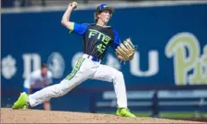  ?? Haldan Kirsch/ Post- Gazette ?? FTB Tucci Northeast pitcher Cameron Rokisky throws to the plate at the Pitt Baseball Summer Team Camp Saturday.