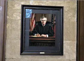  ?? (Matt Hutcheson/News-Times) ?? A portrait of Judge David Guthrie is hung near the bench in the 13th Judicial Court Division 6 courtroom. Guthrie will retire at the end of the year after more than 27 years in service to Union County and the other five counties that make up the 13th Judicial District.